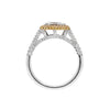 A marquise diamond engagement ring with an east west setting  halo of round yellow diamonds set in rose gold, with smaller white round brilliant cut diamonds set in a contrasting band of platinum. side view