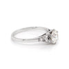 a 0.95 Carat Old Cut Diamond Engagement Ring with 6 smaller diamonds set in Platinum