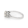 a 0.95 Carat Old Cut Diamond Engagement Ring with 6 smaller diamonds set in Platinum