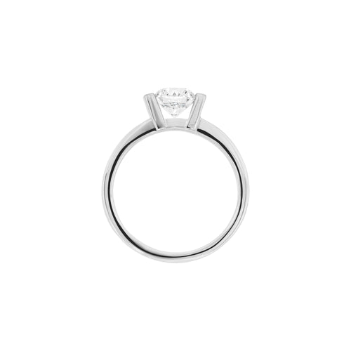 A white gold engagement ring with a round brilliant cut diamond centerpiece, set in a tapered platinum band
