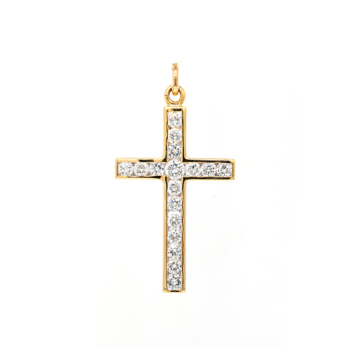 An 18 carat yellow gold diamond cross pendant with multiple round brilliant cut diamonds set within it.