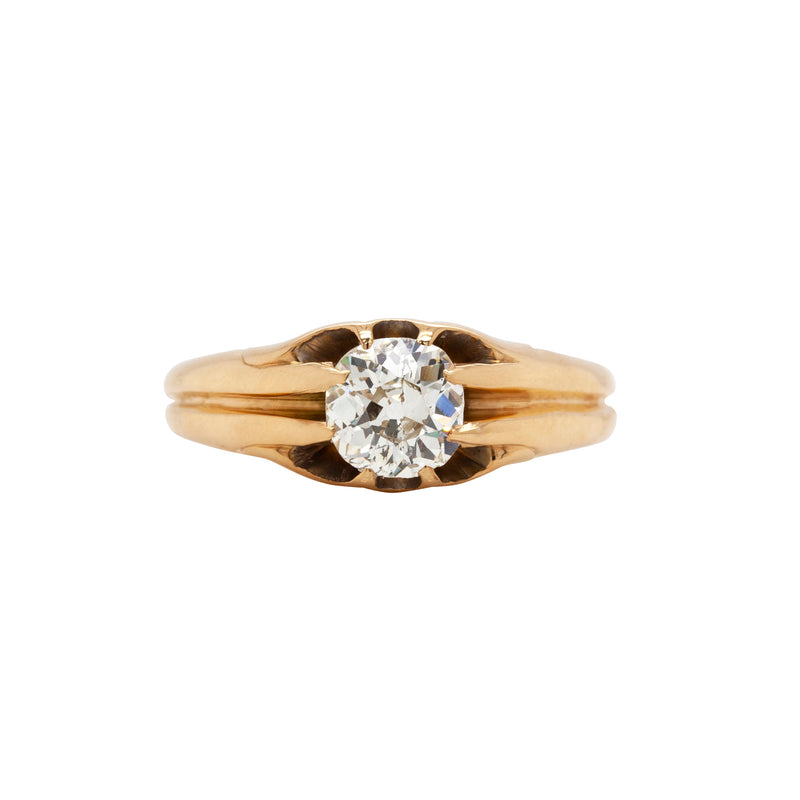 An 18 carat yellow gold old mine cut diamond gent's ring with a UK finger size 'R'.