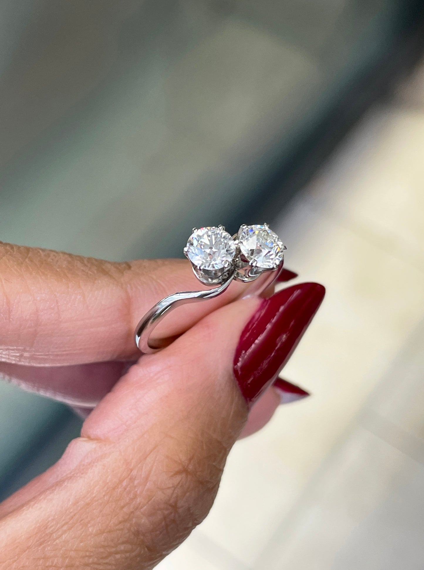 1.01 Carat Diamond Two Stone Crossover Platinum Engagement Ring, Circa 1920s