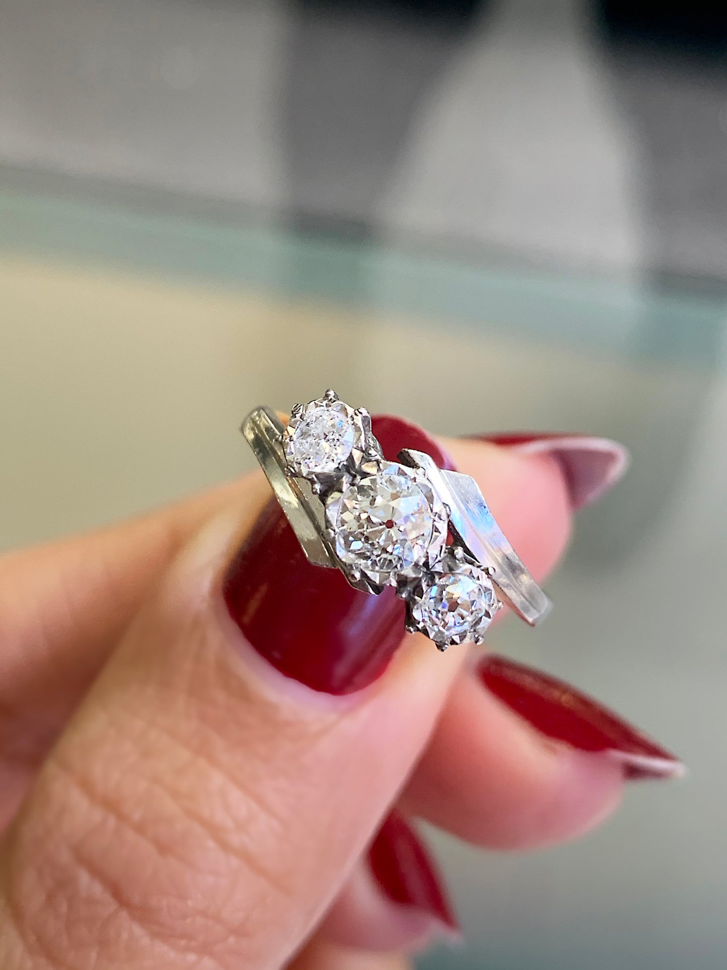 Old Cut Three-Stone Twist 18 Carat Gold and Platinum Ring, Circa 1920s
