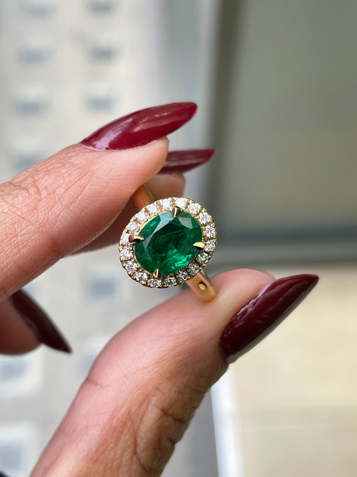 1.85 Carat Emerald and Diamond 18 Carat Yellow Gold Cluster Engagement Ring