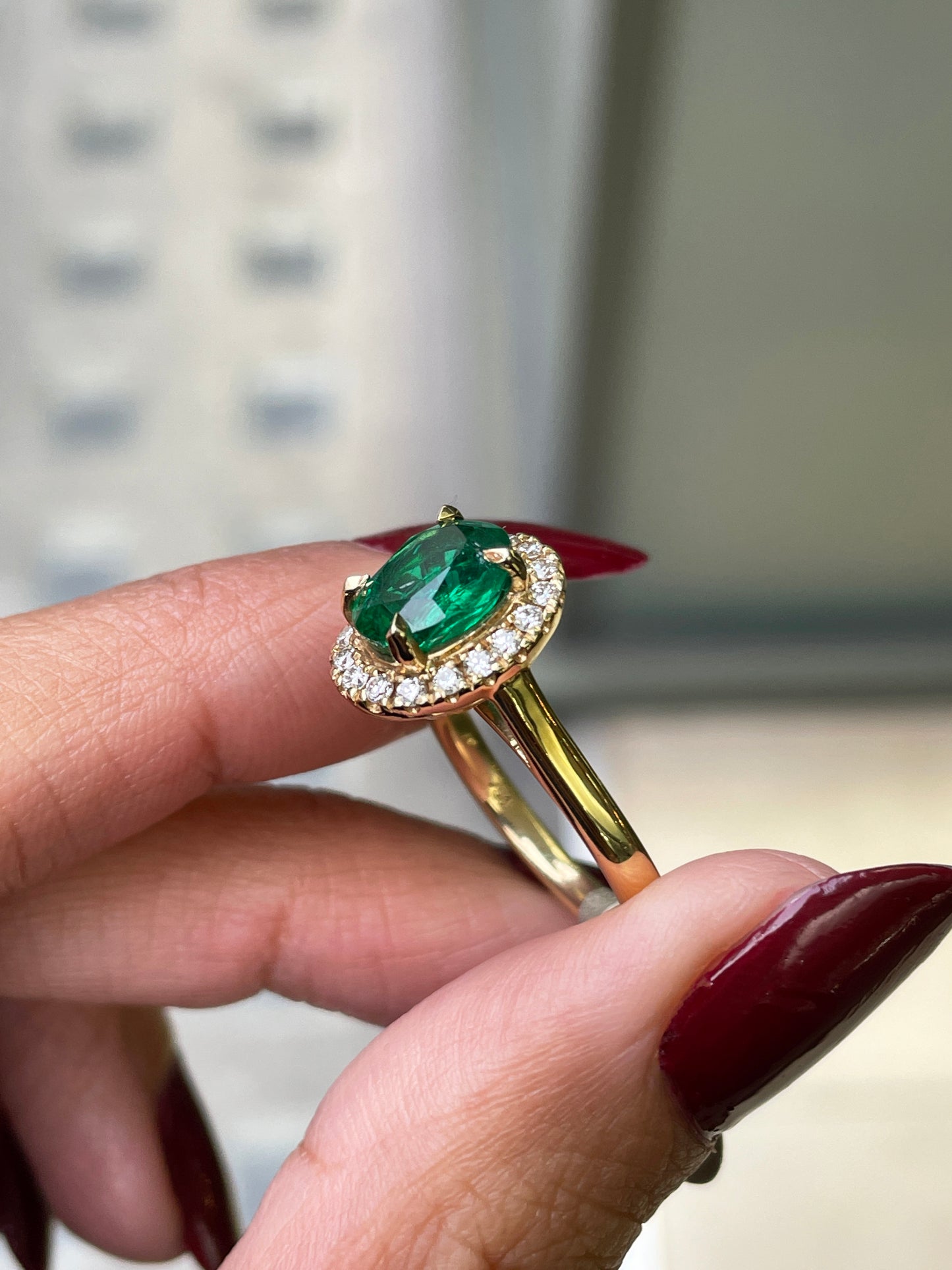 1.85 Carat Emerald and Diamond 18 Carat Yellow Gold Cluster Engagement Ring