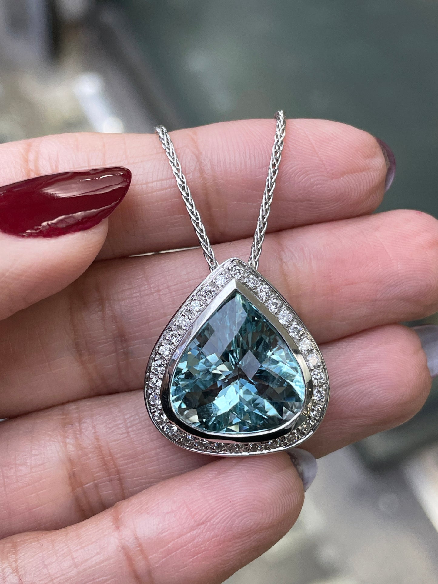 Pear Shape Aquamarine and Diamond Halo 18 Carat White Gold Pendant and Chain
