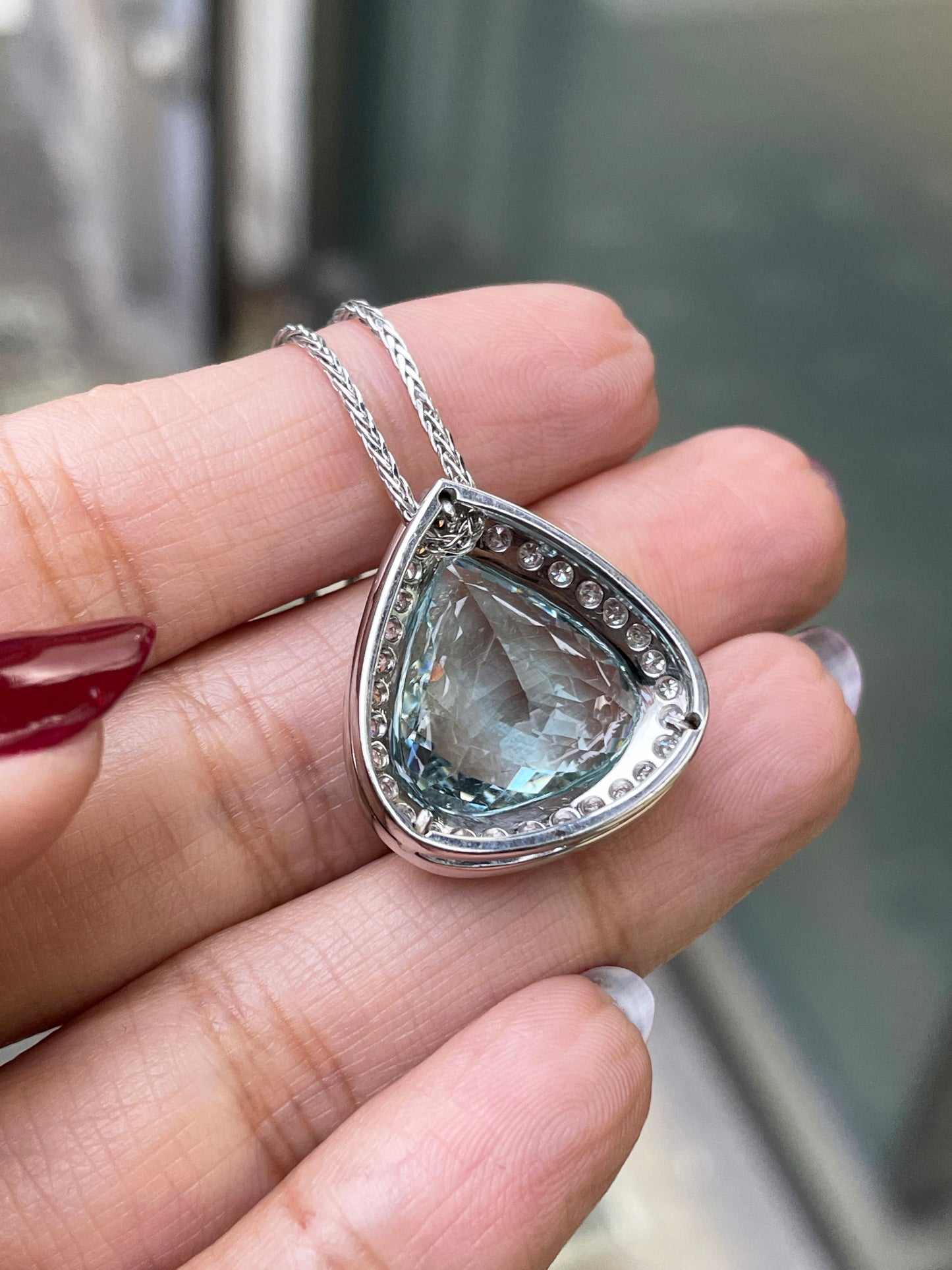 Pear Shape Aquamarine and Diamond Halo 18 Carat White Gold Pendant and Chain