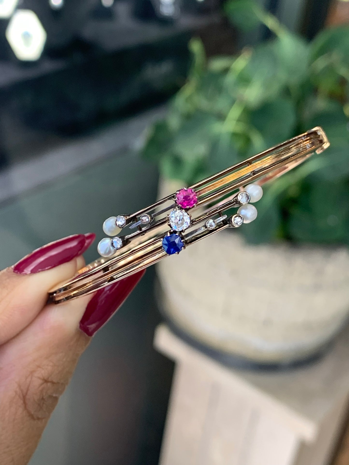 Edwardian 9 Carat Rose Gold Diamond, Sapphire, Ruby and Pearl Bangle, Circa 1900