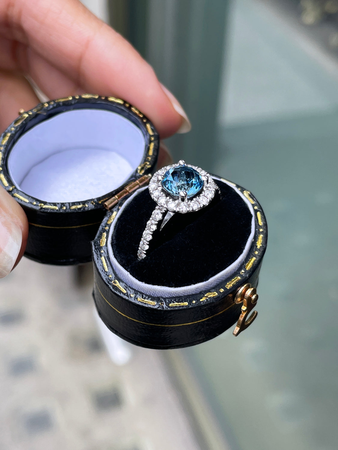 1.10ct Aquamarine and Diamond Halo 18 Carat Gold Engagement Ring