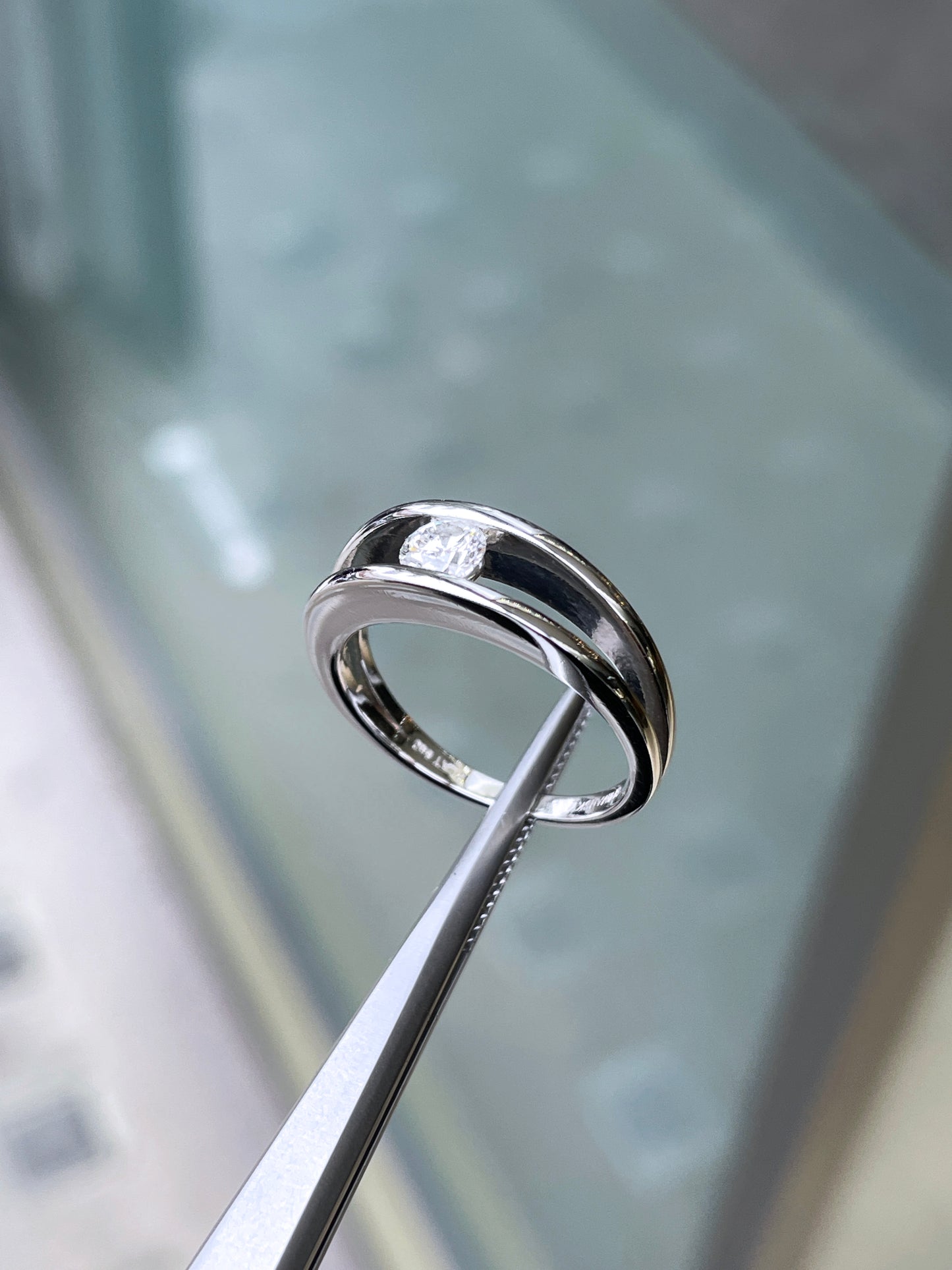 0.35ct F SI2 Round Brilliant Cut Tension Set Diamond Platinum Engagement Ring