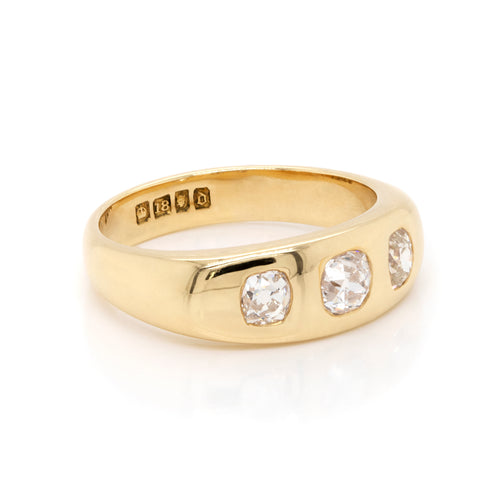 antique gents ring, dating from 1919, features three old mine cut diamonds with a total carat weight of 1.04 carats