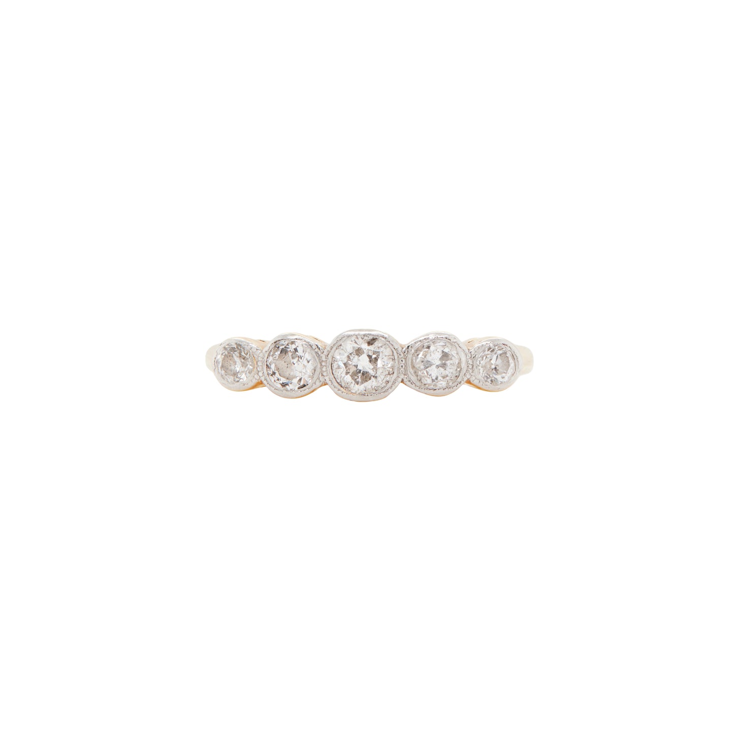 An 18 carat gold five-stone ring with old cut diamonds set in white gold bezels, featuring a yellow gold band.