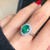 1.83 Carat Emerald and Diamond Platinum Cluster Engagement Ring
