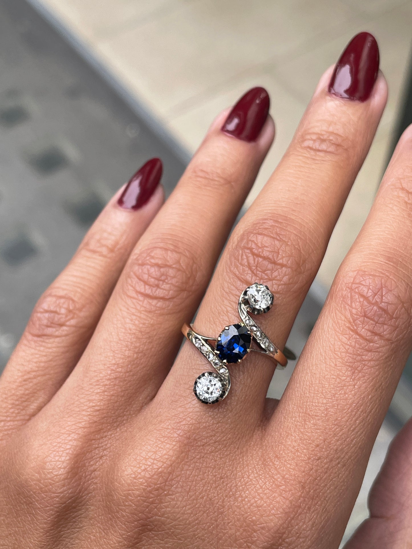 1.04 Carat Oval Sapphire and Old Mine Cut Diamond Three-Stone Ring, Circa 1890