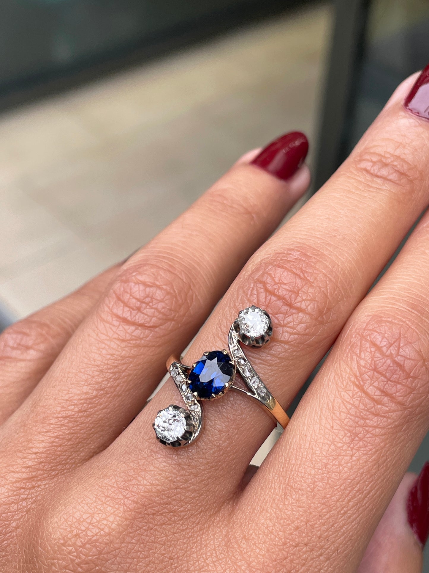 1.04 Carat Oval Sapphire and Old Mine Cut Diamond Three-Stone Ring, Circa 1890