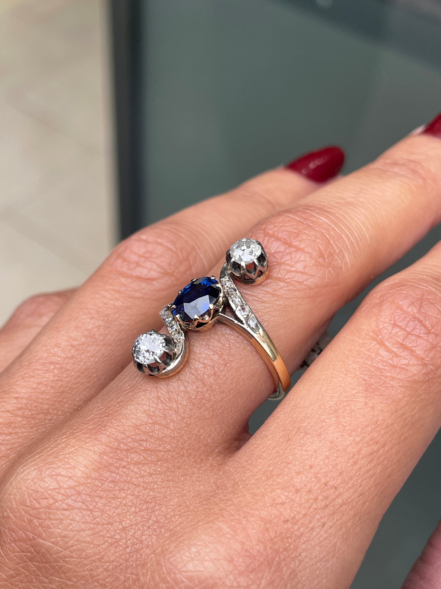 1.04 Carat Oval Sapphire and Old Mine Cut Diamond Three-Stone Ring, Circa 1890