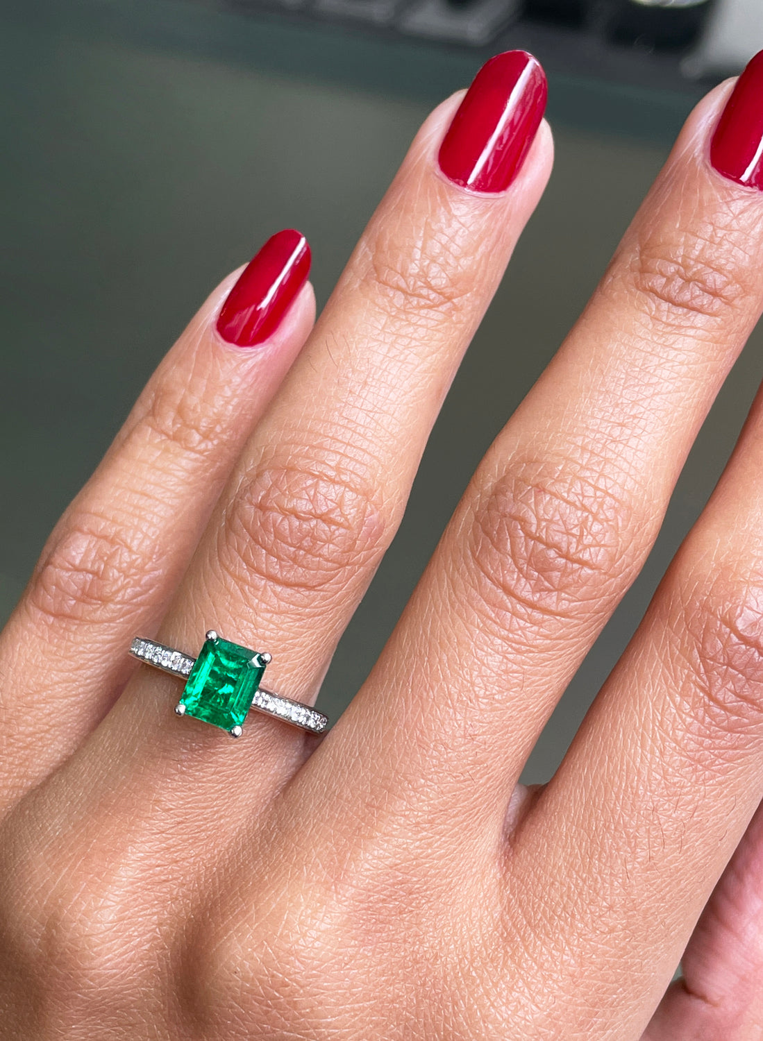 1.36 Carat Emerald Cut Emerald and Diamond Platinum Engagement Ring