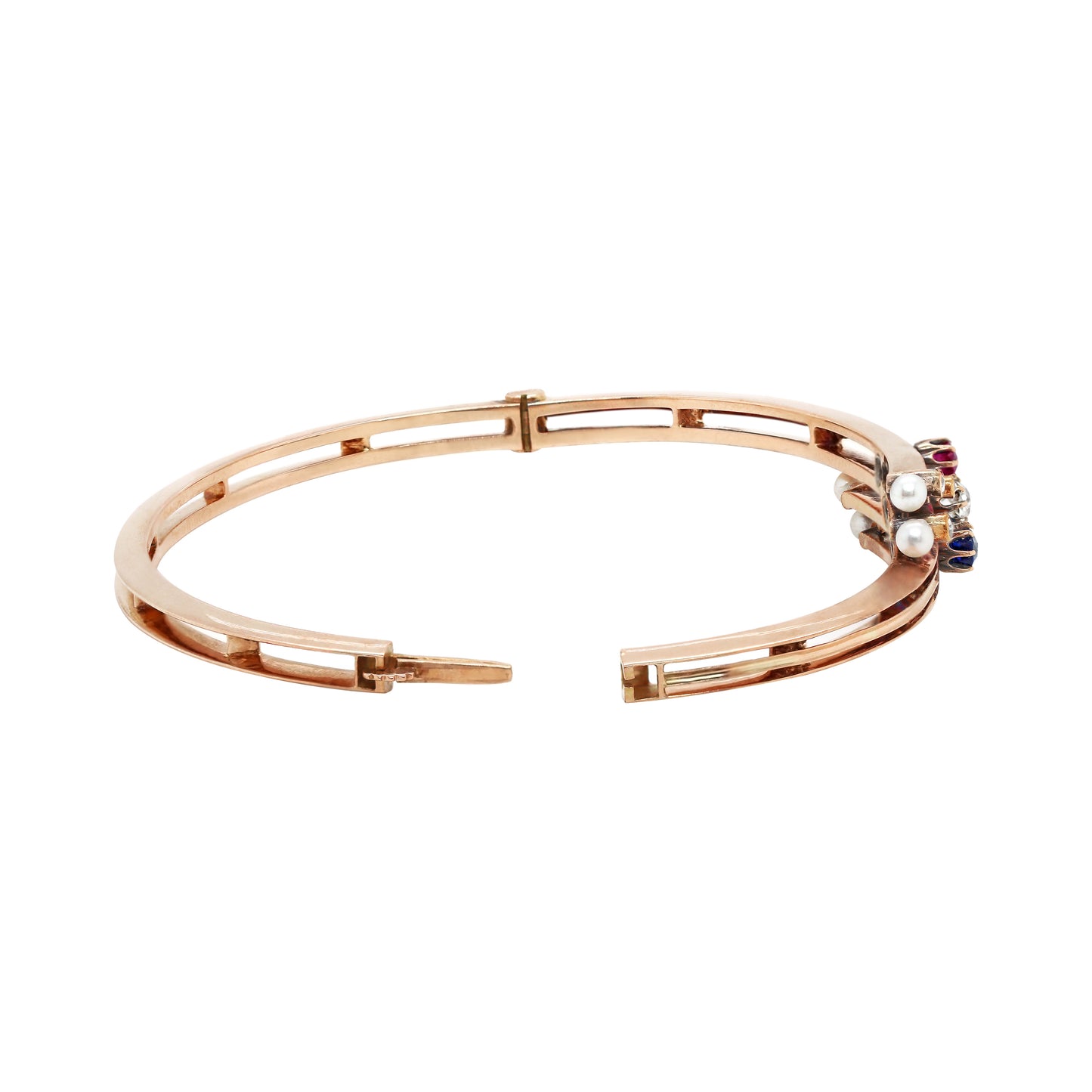 Edwardian 9 Carat Rose Gold Diamond, Sapphire, Ruby and Pearl Bangle, Circa 1900