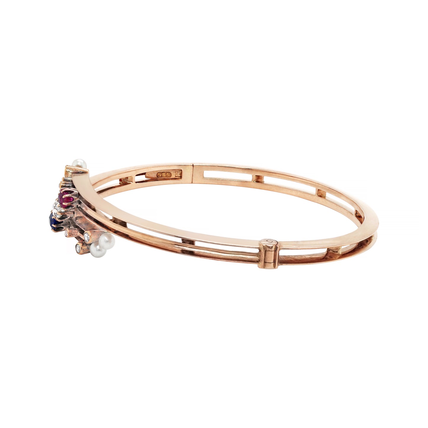 Edwardian 9 Carat Rose Gold Diamond, Sapphire, Ruby and Pearl Bangle, Circa 1900