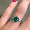 1.77 Carat Oval Emerald and Diamond platinum and 18 Carat Gold Engagement Ring