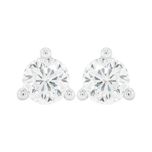 A pair of 18 carat white gold stud earrings with a clear, heart-shaped butterfly back and a central diamond.