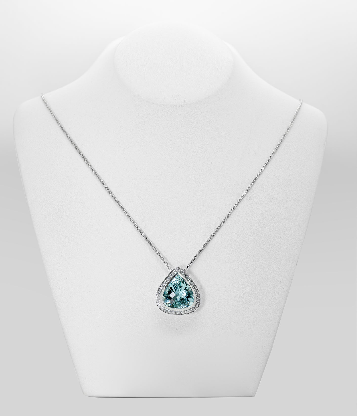 Pear Shape Aquamarine and Diamond Halo 18 Carat White Gold Pendant and Chain