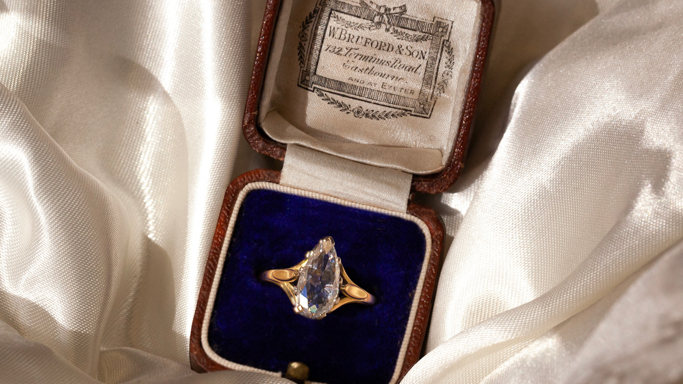 rose cut diamond vintage engagement ring in a box