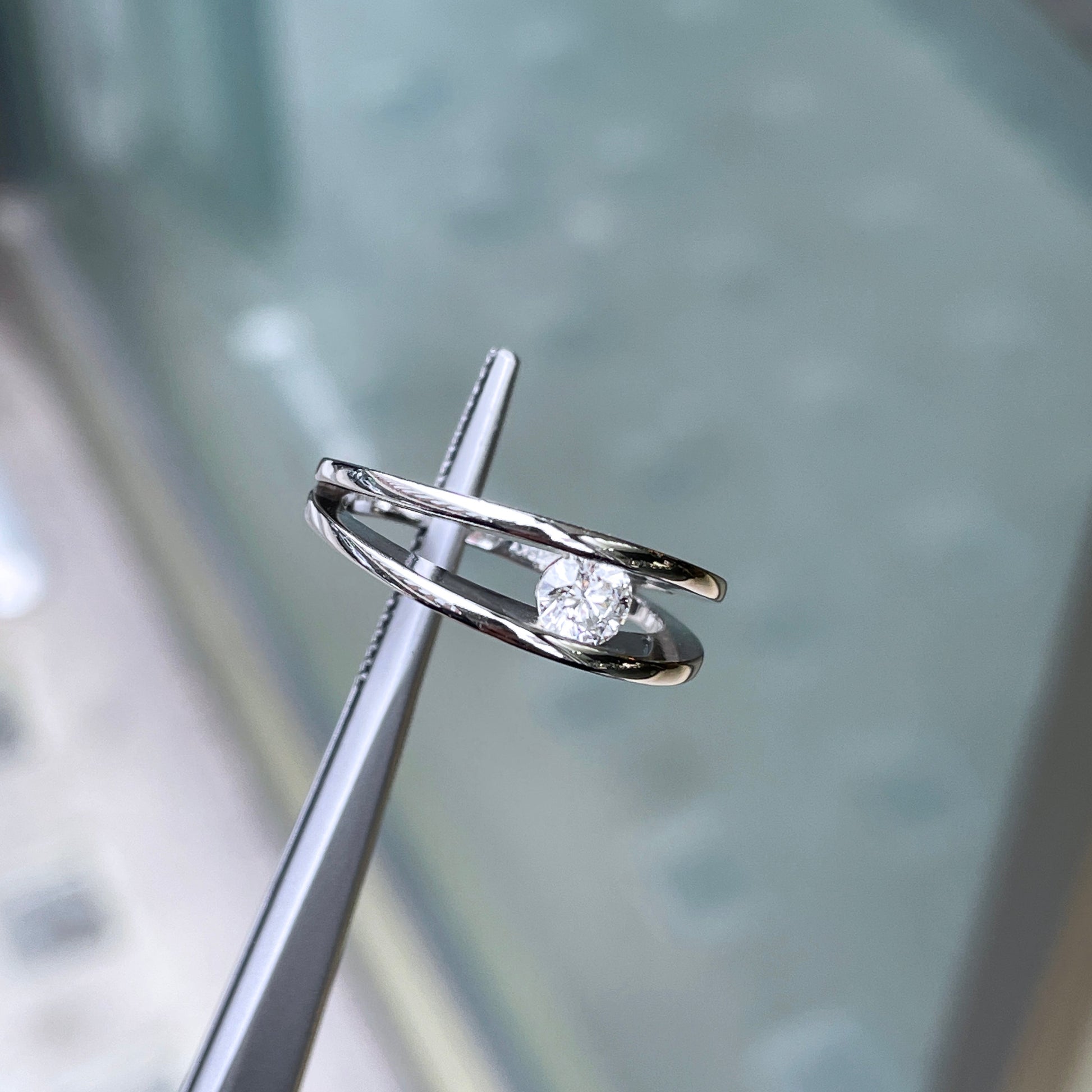 0.35ct F SI2 Round Brilliant Cut Tension Set Diamond Platinum Engagement Ring lifestyle side