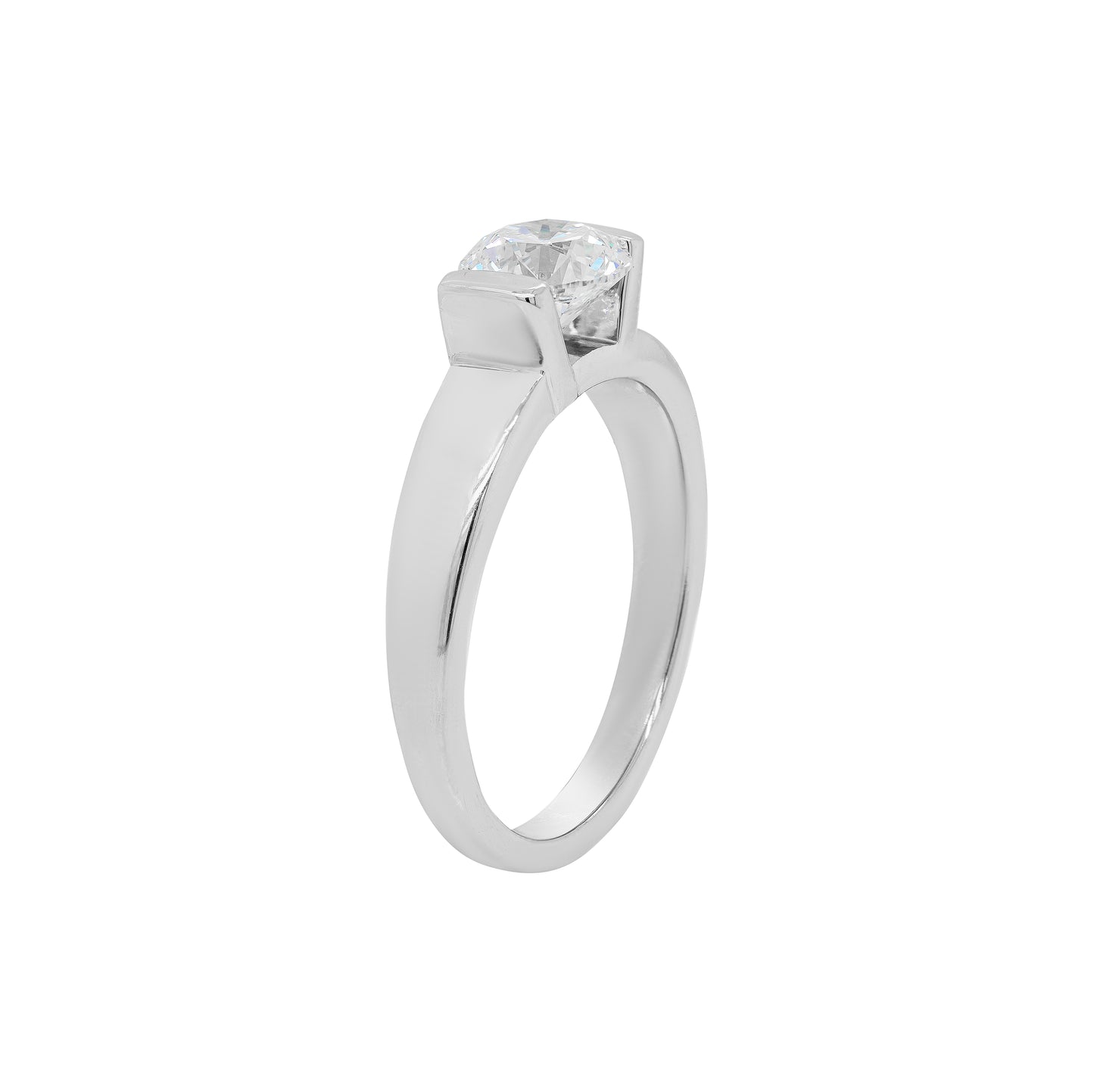 A white gold engagement ring with a round brilliant cut diamond centerpiece, set in a tapered platinum band.