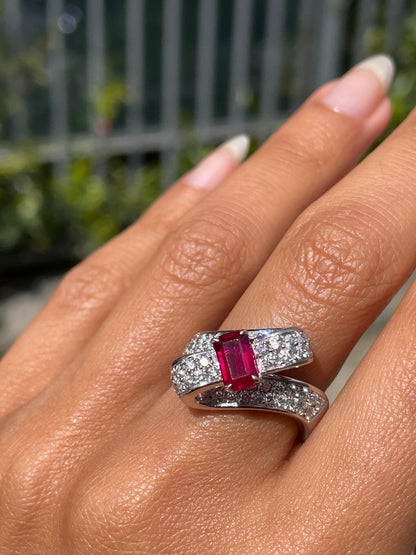 18ct white gold ribbon ring with a 1.04ct emerald cut ruby and 1.30ct diamonds on hand