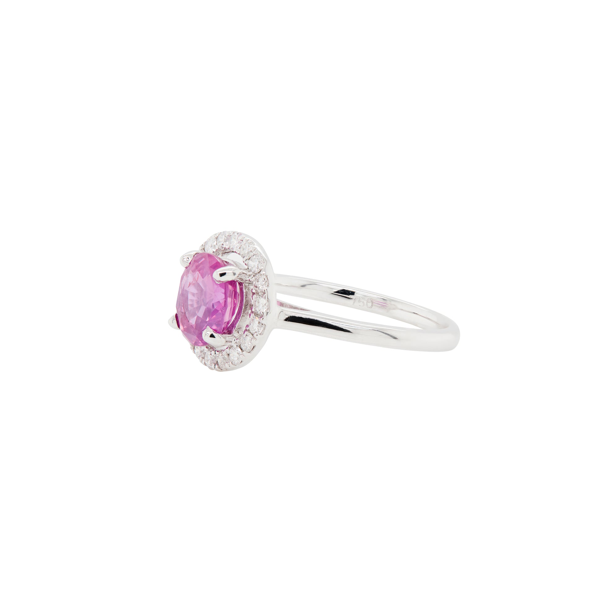 white gold ring with a pink gemstone on a white background
