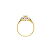 An 18 carat white and yellow gold pear shape diamond coronet cluster engagement ring with a central diamond surrounded by a halo of round brilliant cut diamonds.