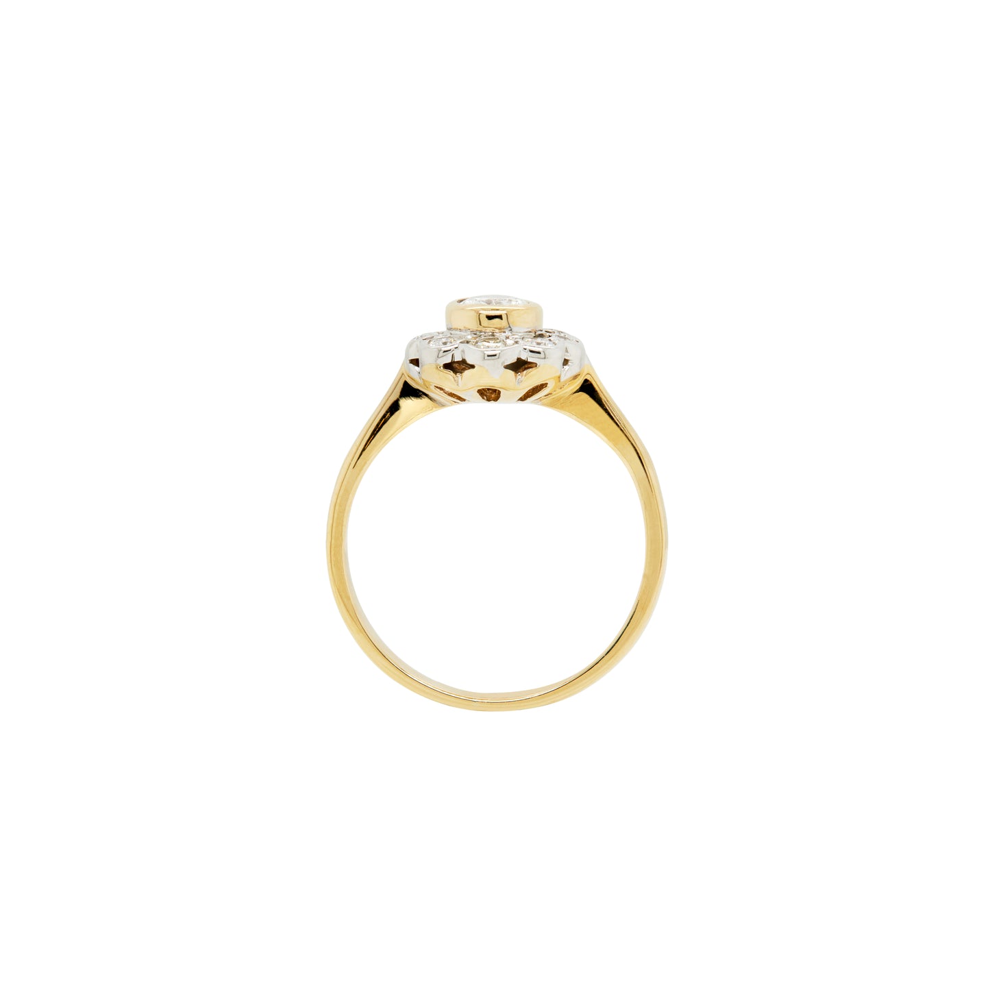 An 18 carat white and yellow gold pear shape diamond coronet cluster engagement ring with a central diamond surrounded by a halo of round brilliant cut diamonds.