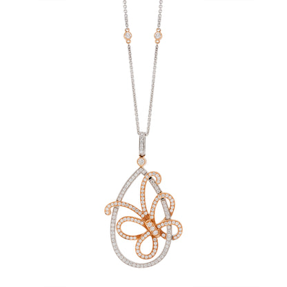 An 18 carat white and rose gold diamond butterfly pendant with a chain.