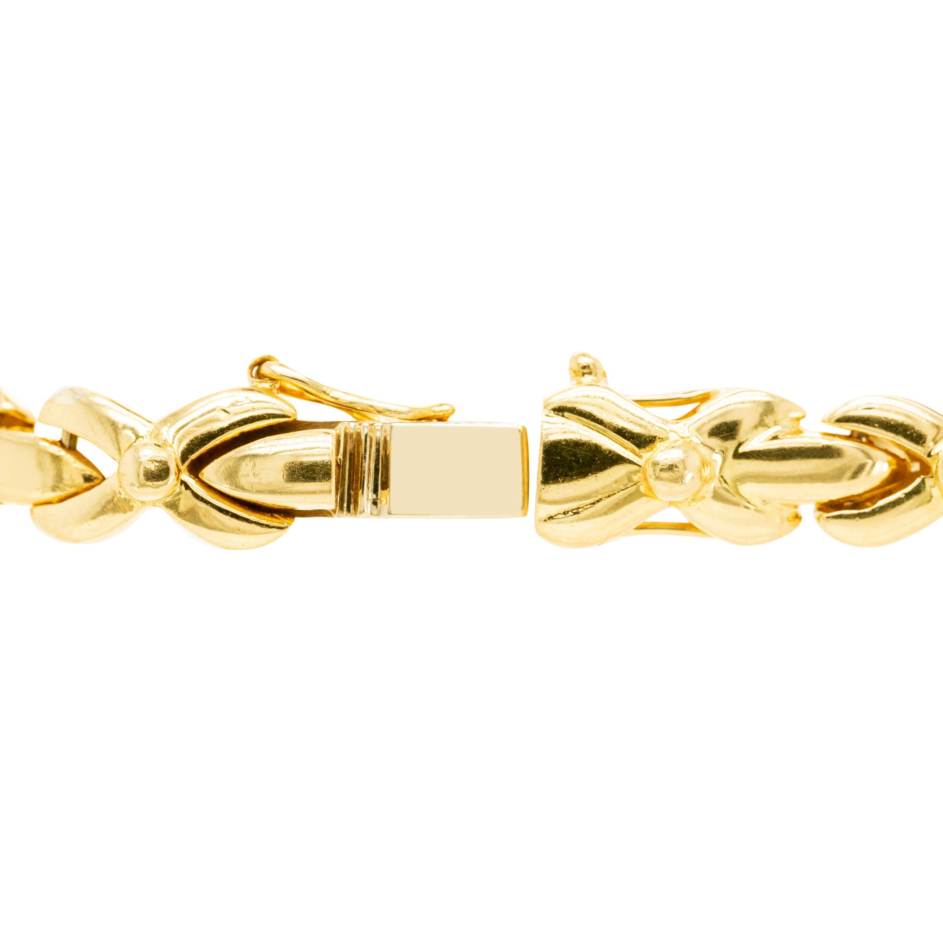 clasp of 18ct yellow gold bracelet with 1.25ct diamonds set in alternating ‘X’ and bar links.