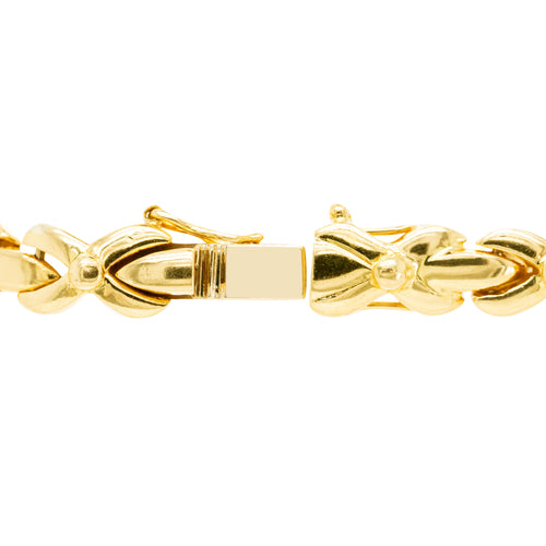 clasp of 18ct yellow gold bracelet with 1.25ct diamonds set in alternating ‘X’ and bar links.
