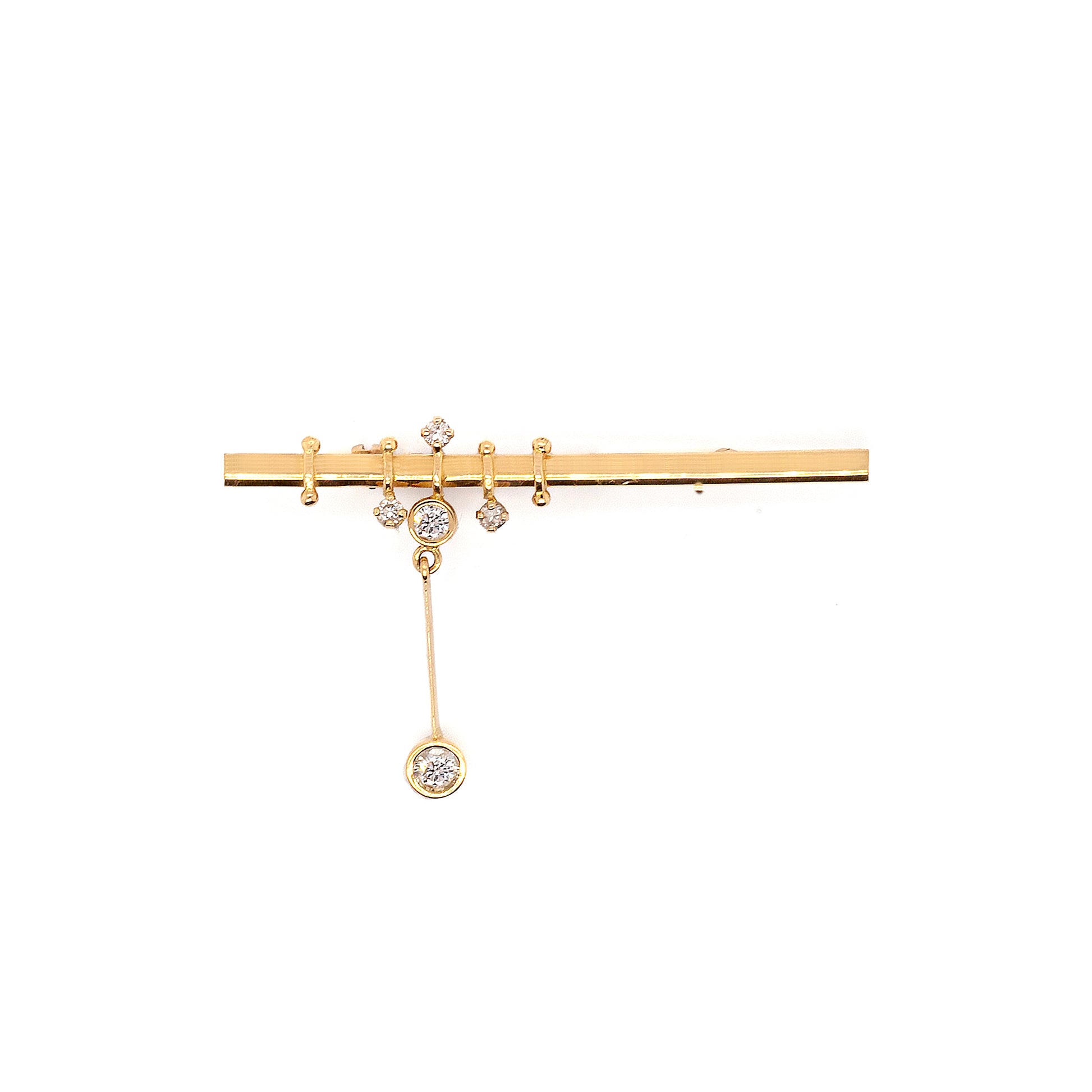 An 18 carat yellow gold bar brooch with five round brilliant cut diamonds attached to it, displayed against a white background.