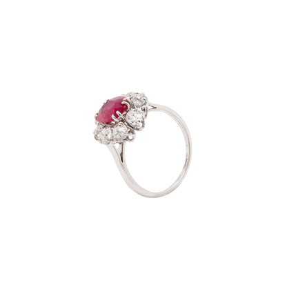 An 18ct white gold ruby and old cut diamond cluster engagement ring with French hallmarks.
