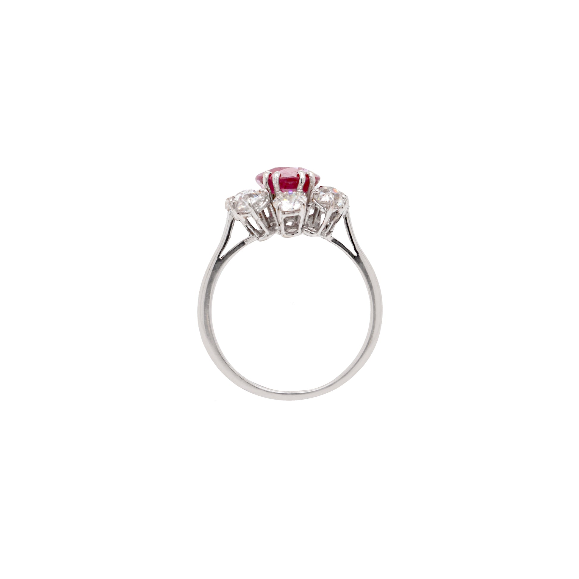 An 18ct white gold ruby and old cut diamond cluster engagement ring with French hallmarks.