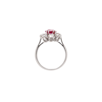 An 18ct white gold ruby and old cut diamond cluster engagement ring with French hallmarks.