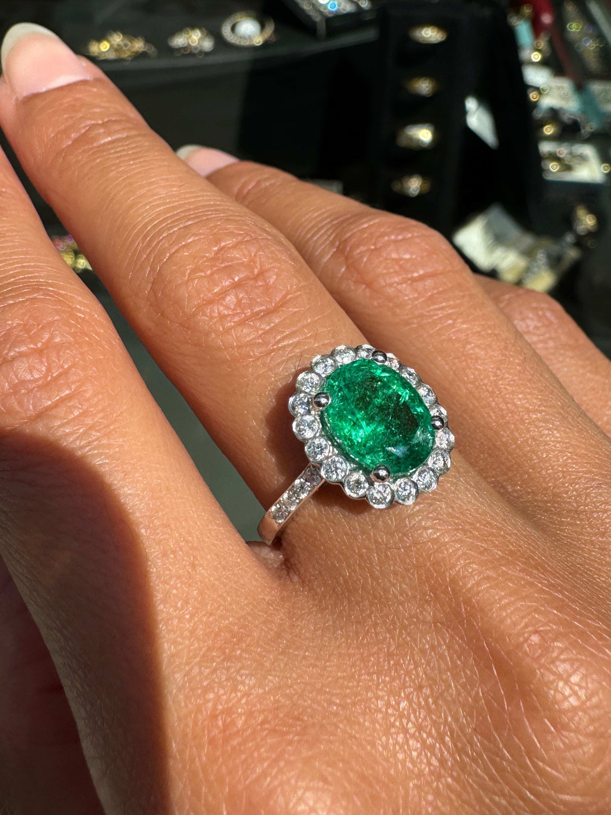 2.39ct Oval Emerald and Diamond Halo 18 Carat White Gold Cluster Engagement Ring