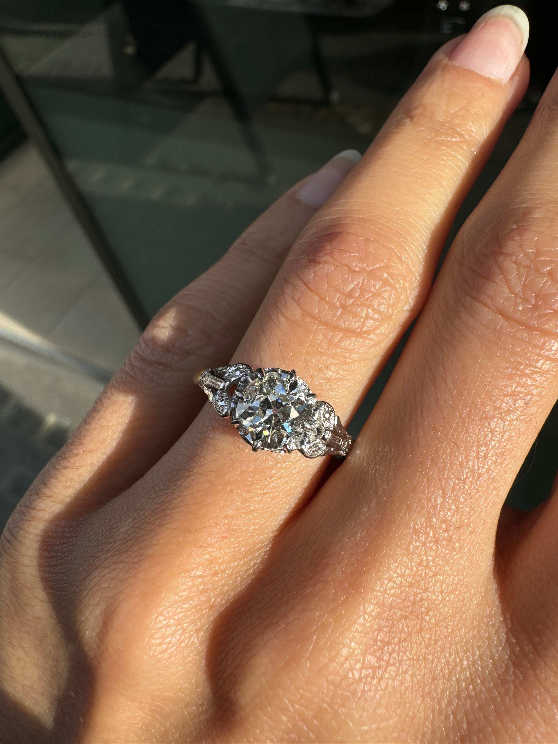 Antique 1.29ct Old Mine Cut Diamond 18 Carat Gold and Platinum Engagement Ring on hand 1