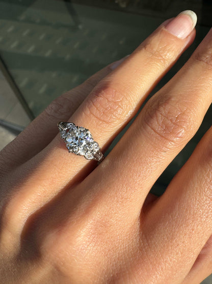 Antique 1.29ct Old Mine Cut Diamond 18 Carat Gold and Platinum Engagement Ring on hand 