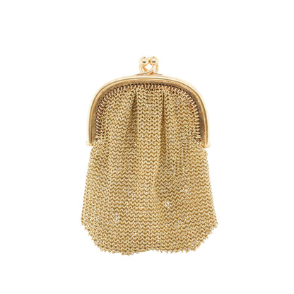 Gold mesh purse on a white background