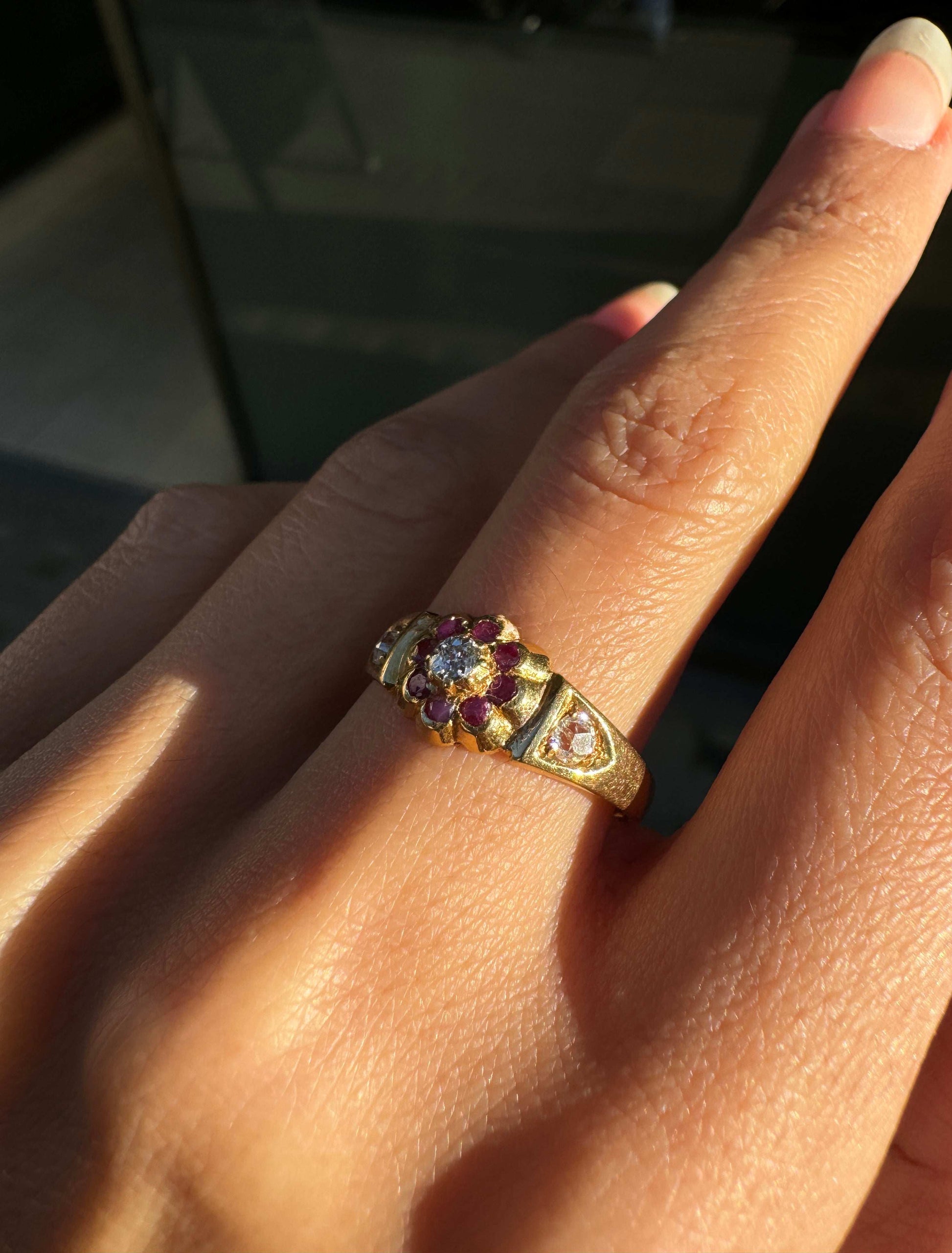 lady wearing a beautiful Antique Ruby & Old Cut Diamond Flower Ring