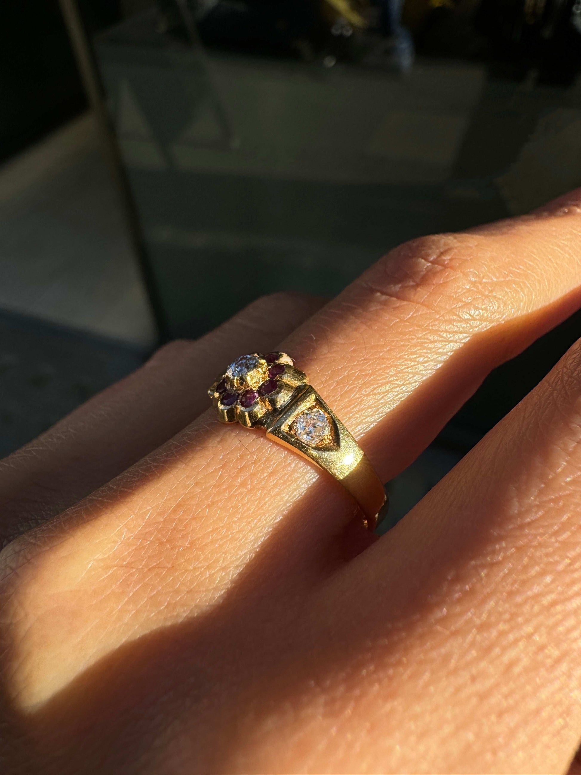 an Antique Ruby & Old Cut Diamond Flower Ring in 18K Yellow Gold, Chester, 1884 on hand