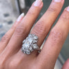 person wearing an arty deco platinum dress ring 