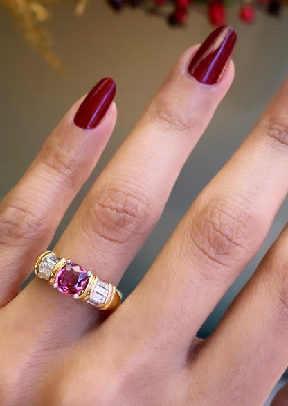 pink sapphire and diamond 18c yellow gold ring  on ladies finger