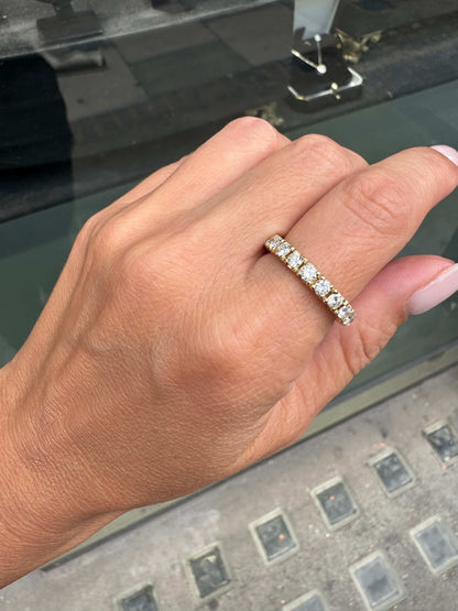 Hand wearing a Diamond Full Eternity Band Ring in 18ct Yellow Gold